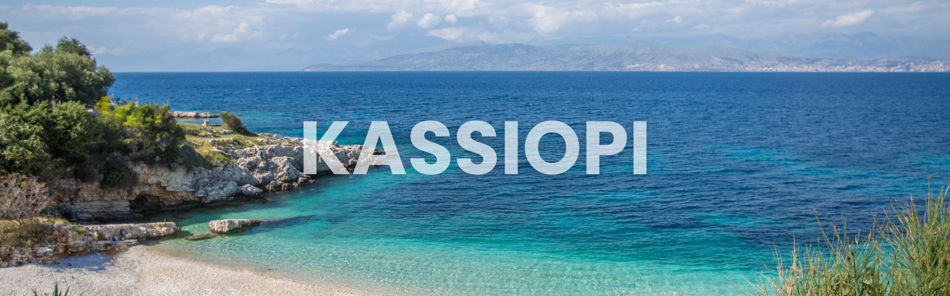 Kassiopi beach with view onto the Albanian coastline - Corfu - Greece - Canva Pro Kassiopi beach with view onto the Albanian coastline - Corfu - Greece - Canva Pro