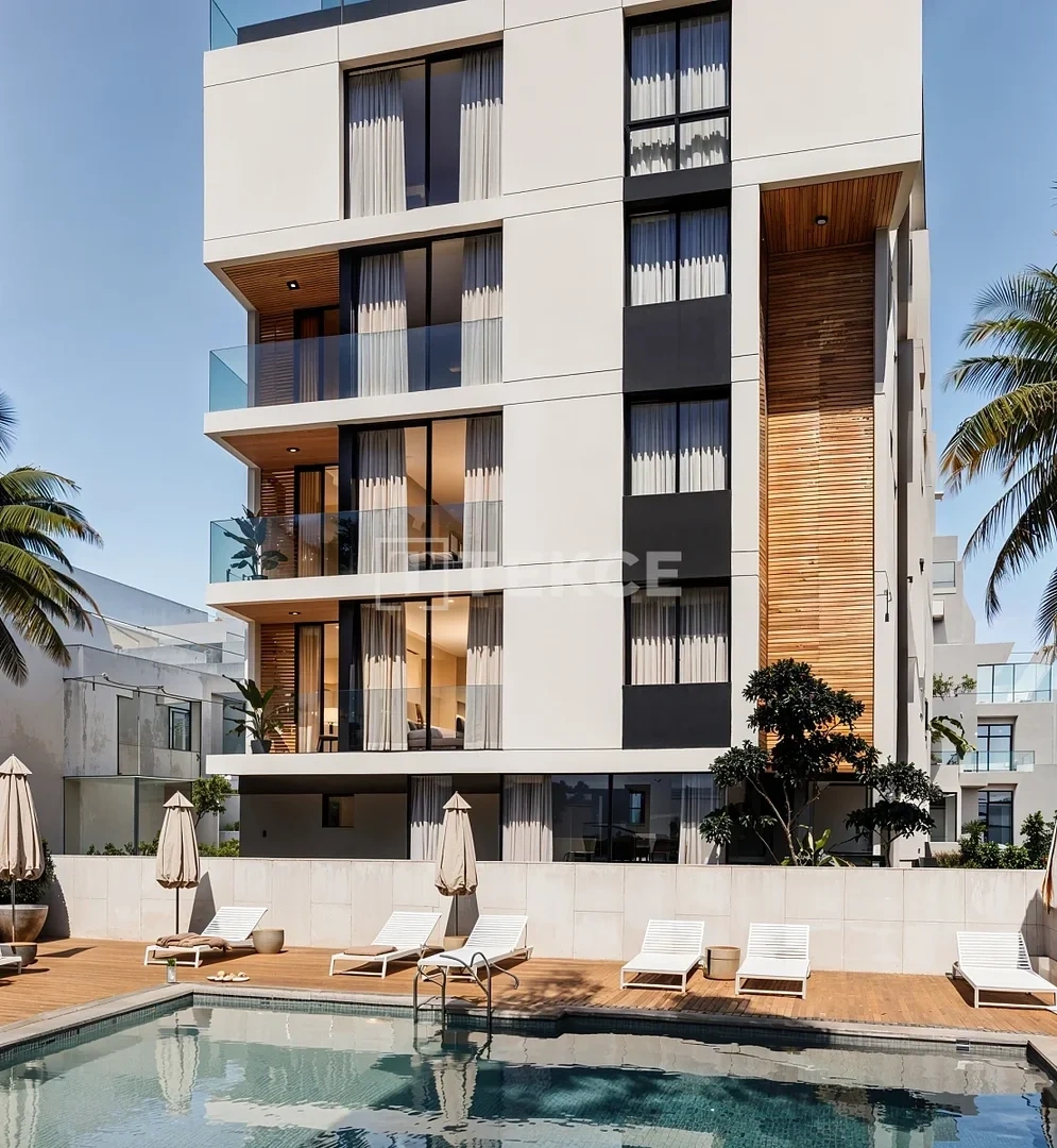Apartamento a praia ao pé com piscina